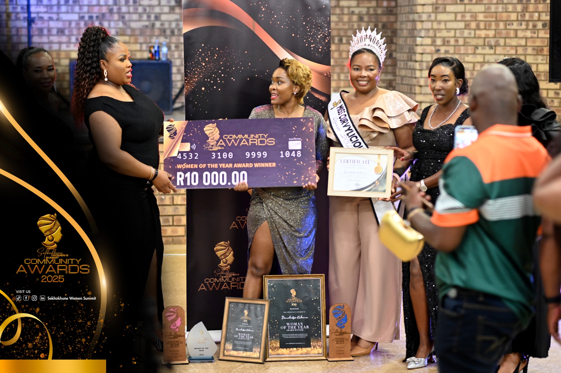 Woman of the Year winner with R10,000 cheque