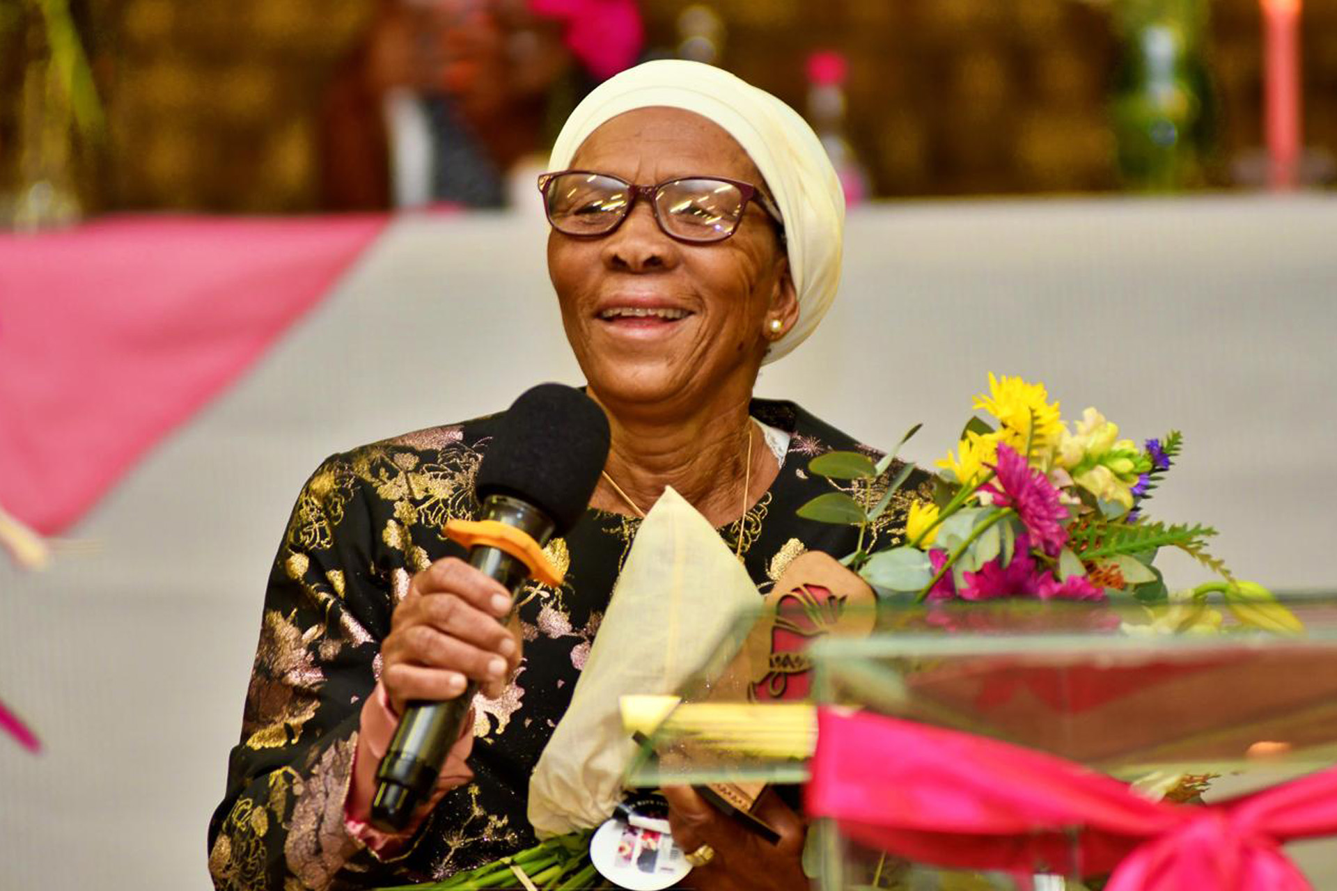 Elder speaking at the podium